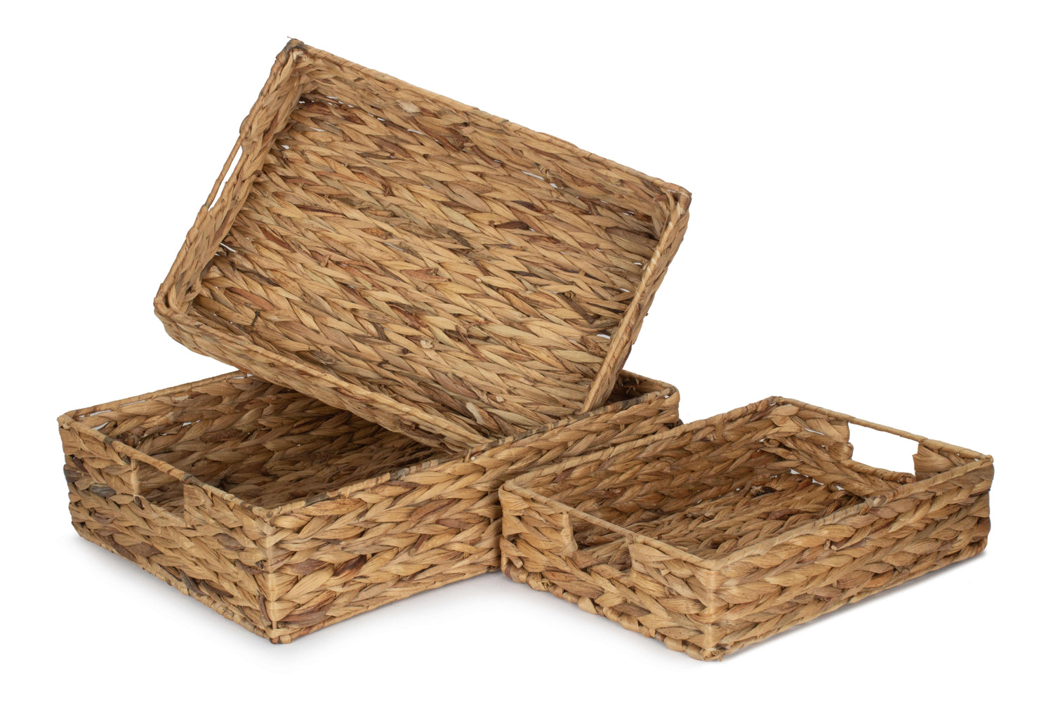 Set of three woven baskets with lids on a white background