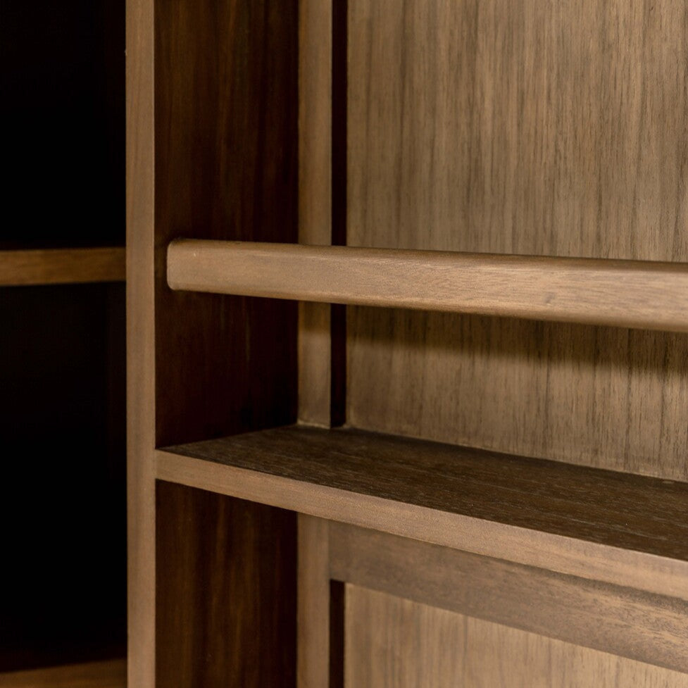 Wooden cupboard with shelves and a dark background