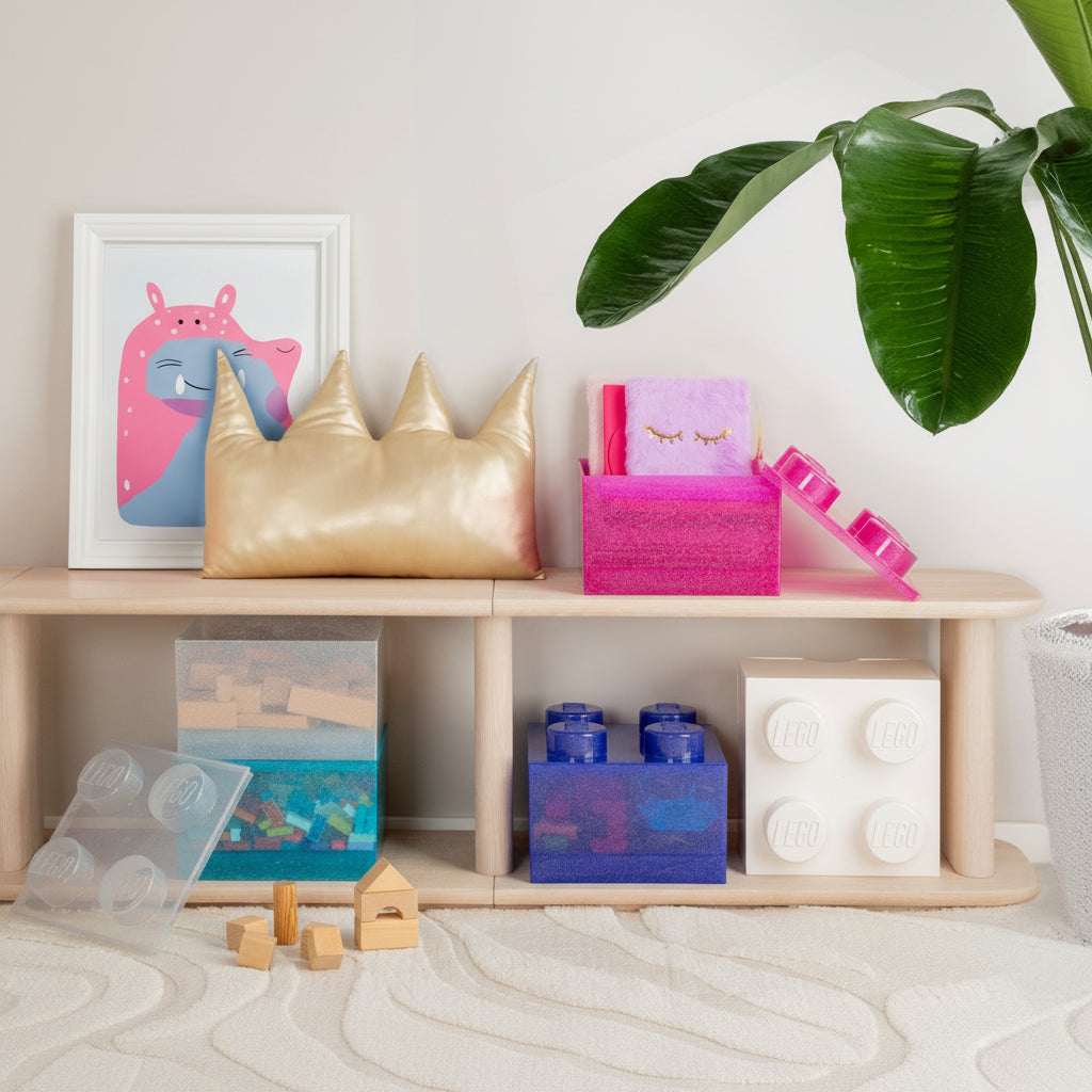 Children's playroom with shelves displaying toys and a framed picture of a cartoon character.