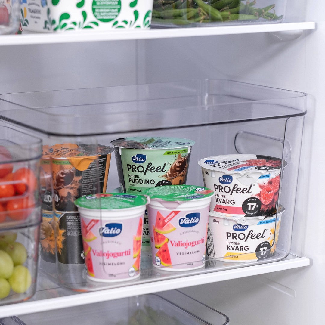 Yogurt containers on a refrigerator shelf with visible Valio branding.
