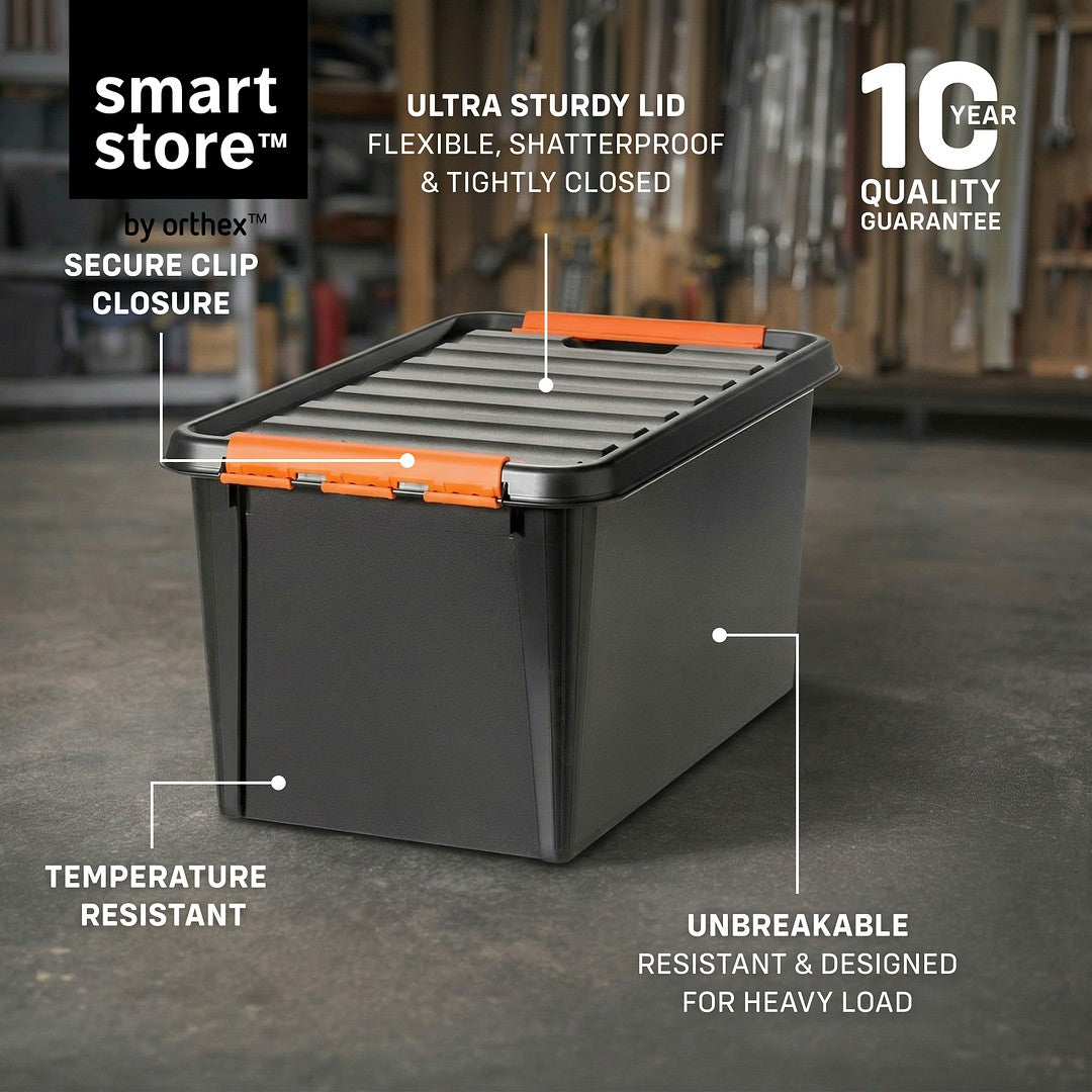 Black storage bin with orange clips on a concrete floor, featuring smart store branding and product features.