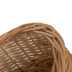Close-up of a woven basket on a white background