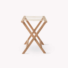 Wooden folding stool on a white background