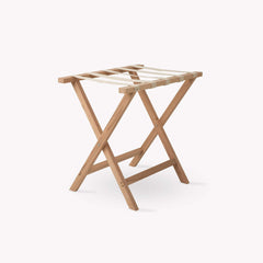 Wooden folding laundry rack on a white background