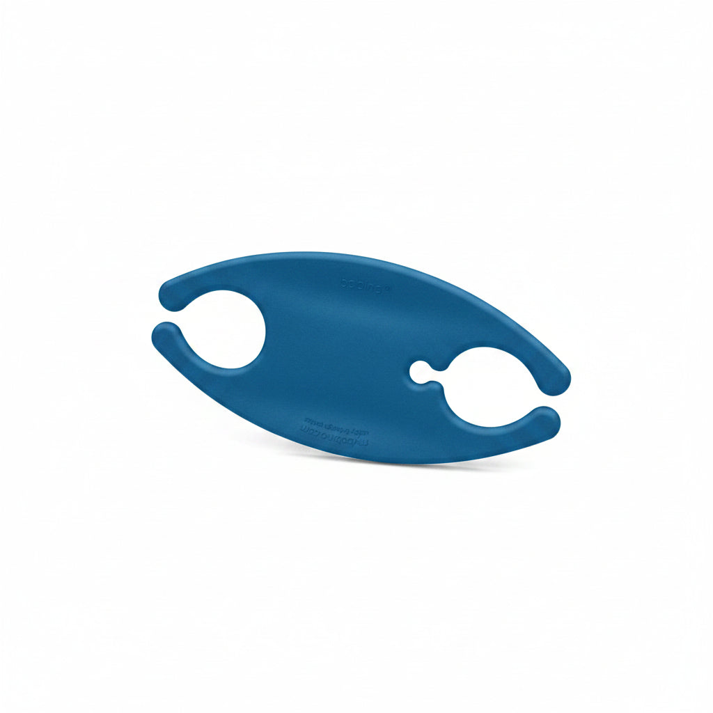 Blue plastic tool with a unique design on a white background