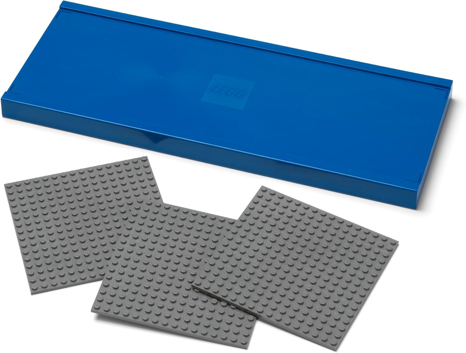Two gray building blocks and a blue storage box on a white background