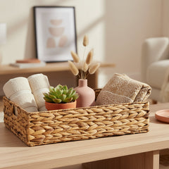 Woven brown basket on a white background