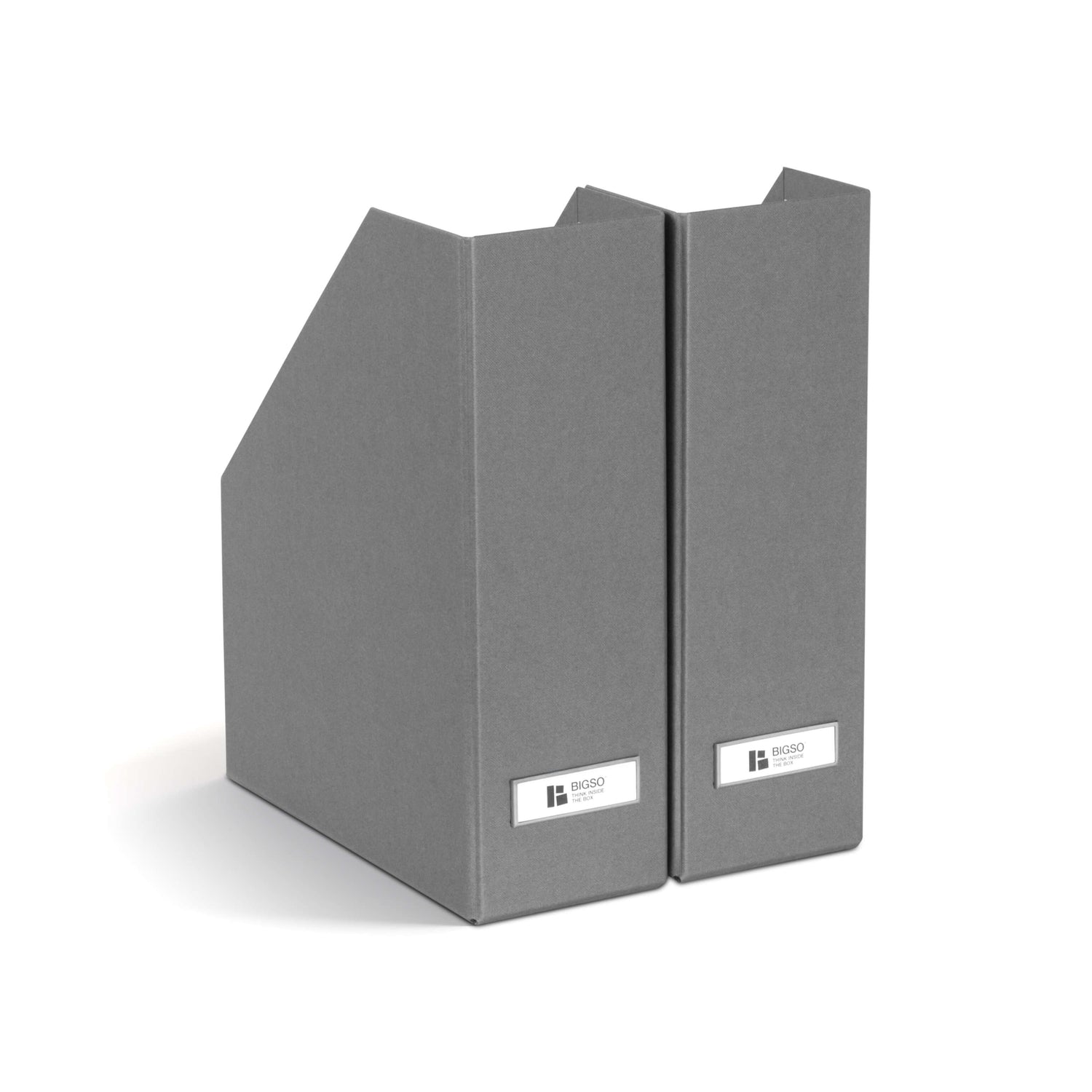 Gray magazine holder with a brand label on a white background