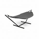 A black hammock with a quilted sling fabric and a matching black metal A-frame stand, shown against a plain white background.