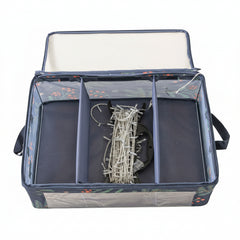 Storage bag with compartments containing fairy lights on a white background
