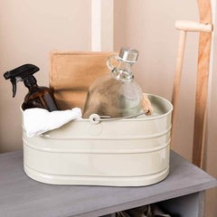 Metal bucket with cleaning supplies on a shelf