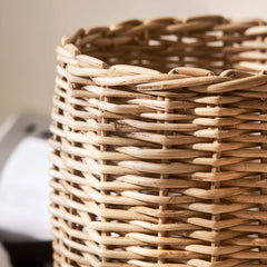 Close-up of a woven basket with a neutral background