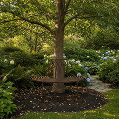 Decorative metal bench with intricate design on a white background